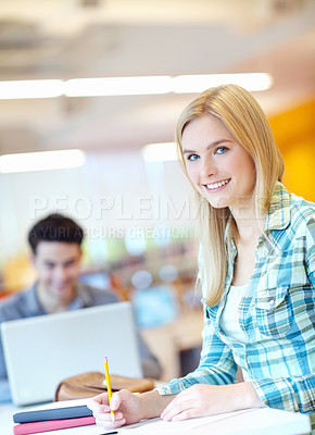 Buy stock photo Portrait, student and woman in library, writing and happiness with exam, planning for project or college. Face, person or girl with knowledge, university or learning with studying or higher education