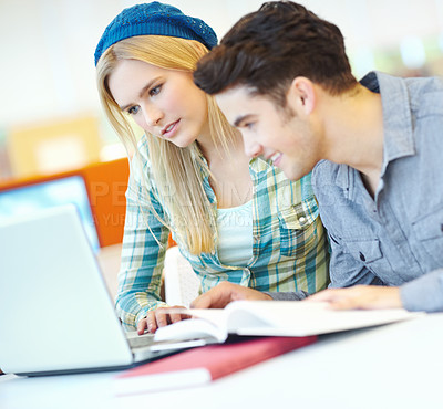 Buy stock photo Education, laptop and notebook with student friends in library at college or university campus for learning. Computer, reading and study with happy people at school desk for scholarship together