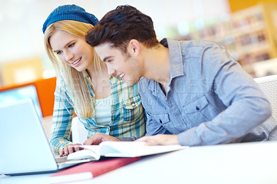 Buy stock photo Laptop, notebook and smile of student friends in library at college or university campus for learning. Computer, education and study with happy people at school desk for scholarship together