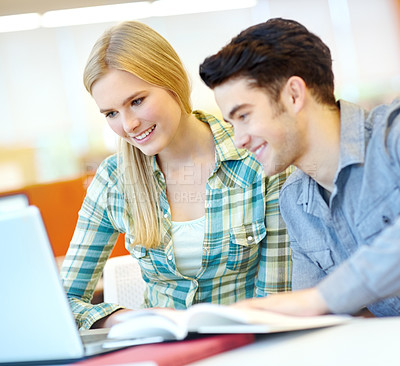 Buy stock photo Laptop, learning and smile of student people in library at college or university campus for development. Computer, education and study with couple of friends at school desk for scholarship together