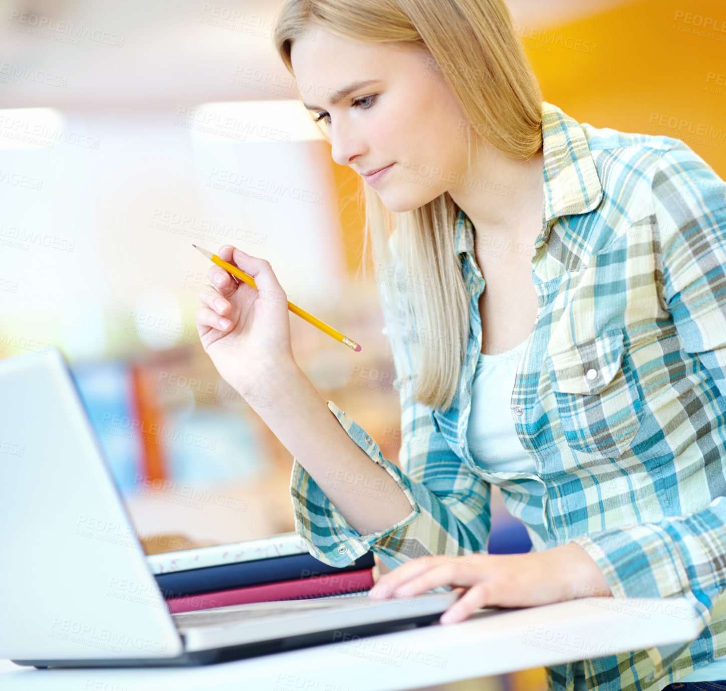 Buy stock photo Girl, university student and reading with laptop at library for research, learning and education. Person, woman and computer at college, campus and books for info, scholarship and study in Germany