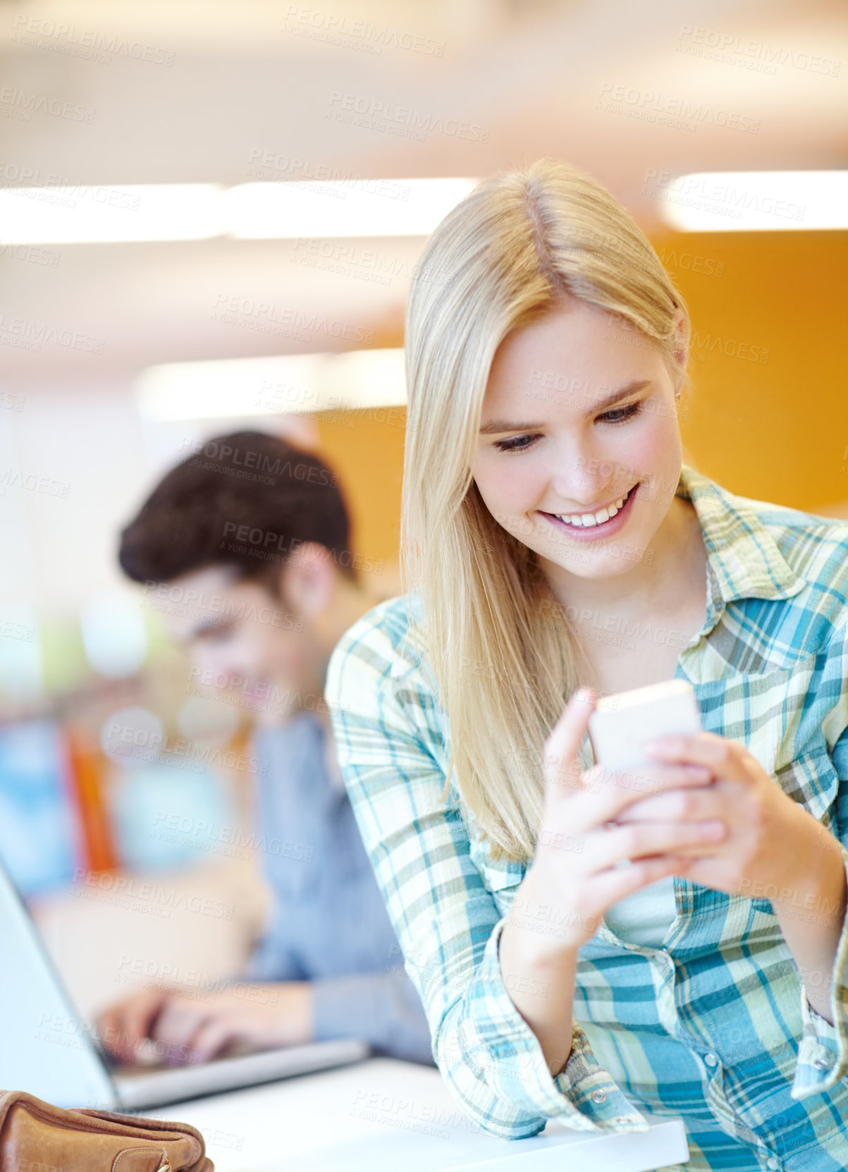 Buy stock photo Happy, student and woman in library, smartphone and typing with connection, texting and digital app. Joy, people and girl with cellphone, message and email for exam results, smile and online reading