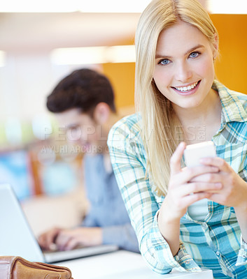 Buy stock photo Portrait, student and woman in library, cellphone and typing with connection, texting and message. Face, college and girl with smartphone, contact and digital app for exam results and online reading