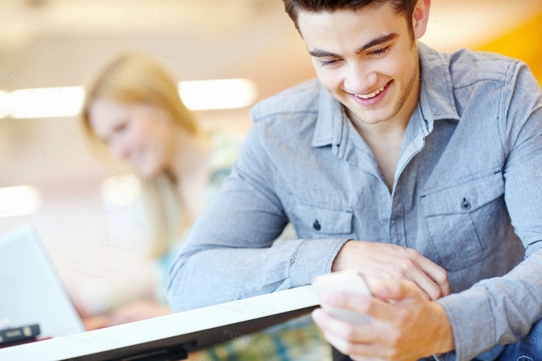 Buy stock photo Happy, student and man in library, smartphone and typing with connection, online reading and email notification. University, people and guy with cellphone, contact and digital app for exam results