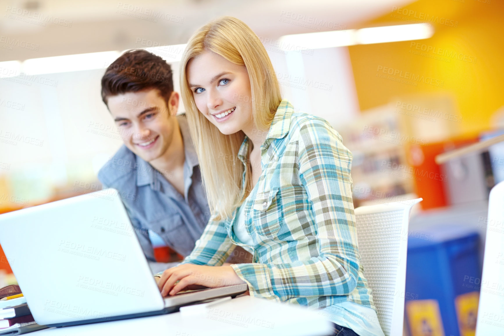 Buy stock photo Education, laptop and smile of student friends in library at college or university campus for learning. Computer, development and study with happy people at school desk for scholarship together