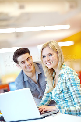 Buy stock photo Students, library and working with laptop for school project and internet research at learning center. University, tech and teamwork for digital assessment with email, web class and smile from study