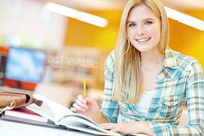 Buy stock photo Girl, university student and education in portrait at library for research, learning and development. Person, woman and happy at college, campus and books for info, scholarship or studying in Germany