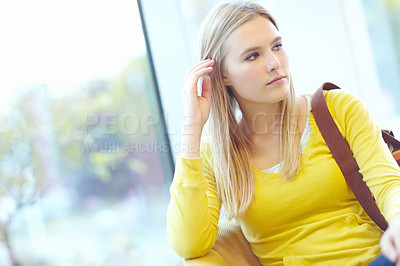 Buy stock photo Girl, thinking and relax in airport waiting area for study abroad or commute as university student. Female person, planning and travel for education, course or college with ideas, itinerary and delay