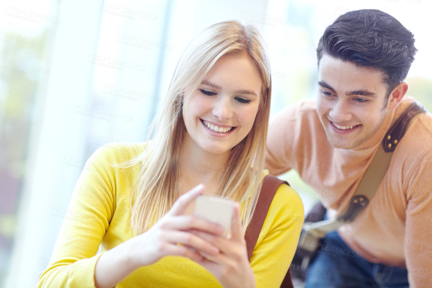 Buy stock photo Happy, typing and couple with smartphone, internet and connection with social media, texting and contact. Smile, man and woman with cellphone, message and communication with email for exam results