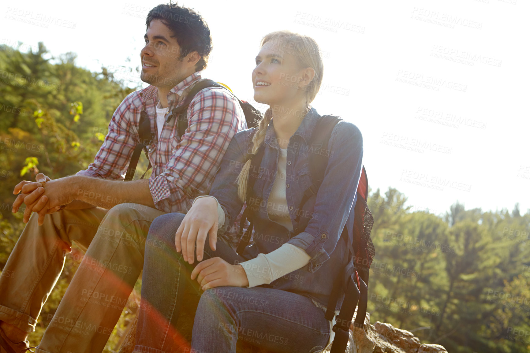 Buy stock photo Resting, view or couple hiking in forest for travel, outdoor adventure or journey in nature together. Hikers, woods or people on tree log to relax on holiday vacation, trip or break to explore park