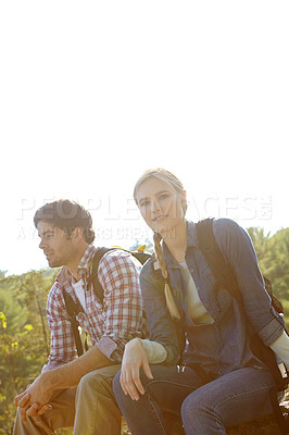 Buy stock photo Resting, portrait or couple hiking in forest for travel, outdoor adventure or journey in nature together. Hikers, woods or people chill on break to relax on holiday vacation or trip to explore park