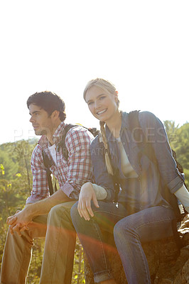 Buy stock photo Chill, portrait or couple hiking in forest for travel, outdoor adventure or journey in nature together. Hikers, woods or people resting on break to relax on holiday vacation or trip to explore park