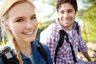 Buy stock photo Woman, portrait or happy couple hiking in forest for travel, outdoor adventure or journey in nature. Support, hikers or people in woods together on holiday vacation, trip or break to explore park