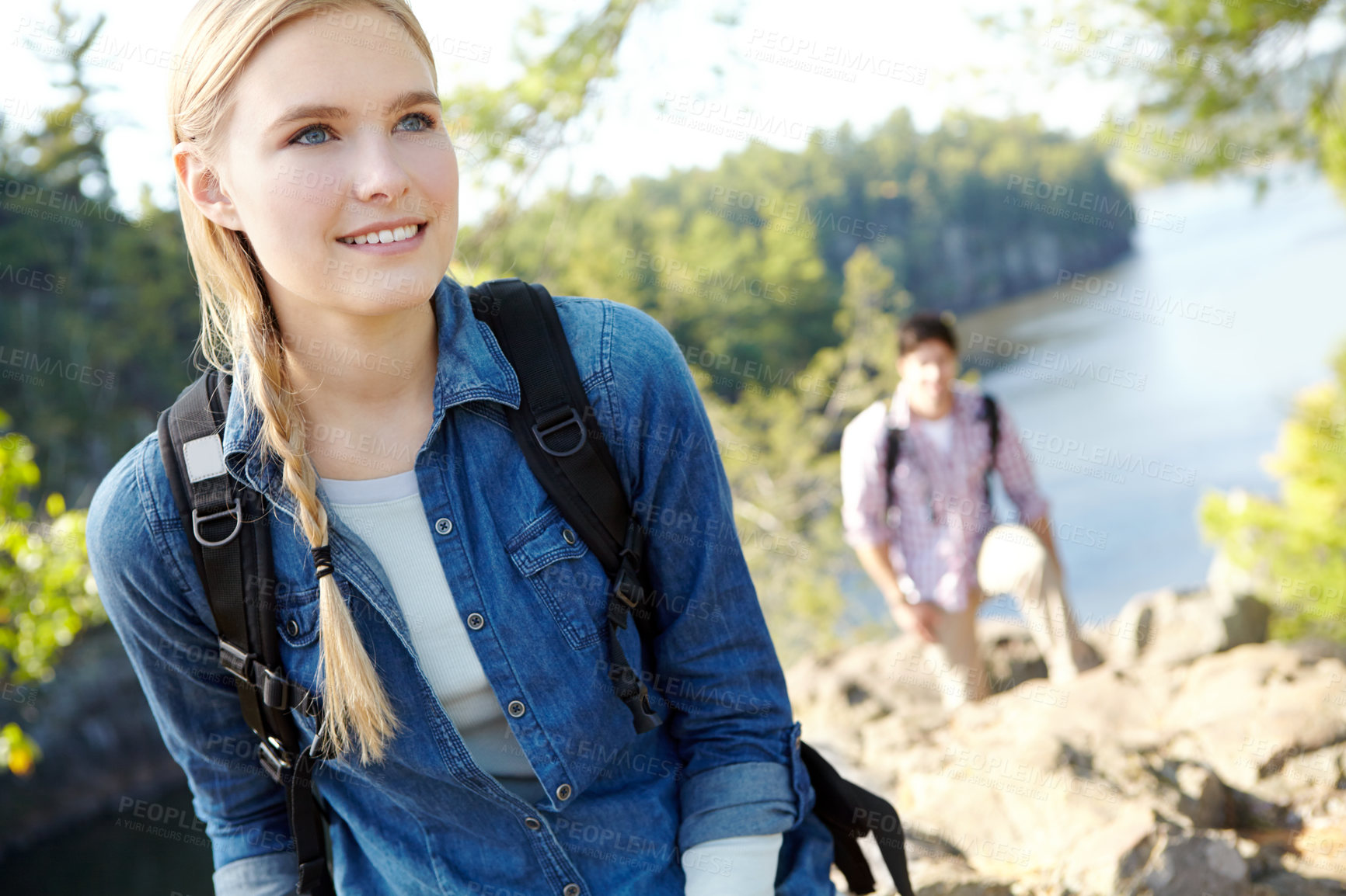 Buy stock photo Mountain, woman or couple hiking by river for travel, outdoor adventure or journey in nature or lake. Romantic, woods or people resting to relax on holiday vacation to explore forest or park on break