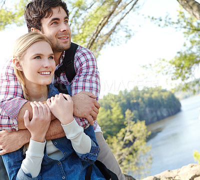 Buy stock photo View, hug or couple by river in forest for travel, outdoor adventure or hiking in nature together. Romantic, woods and happy people resting to relax on holiday vacation, break or trip to explore park