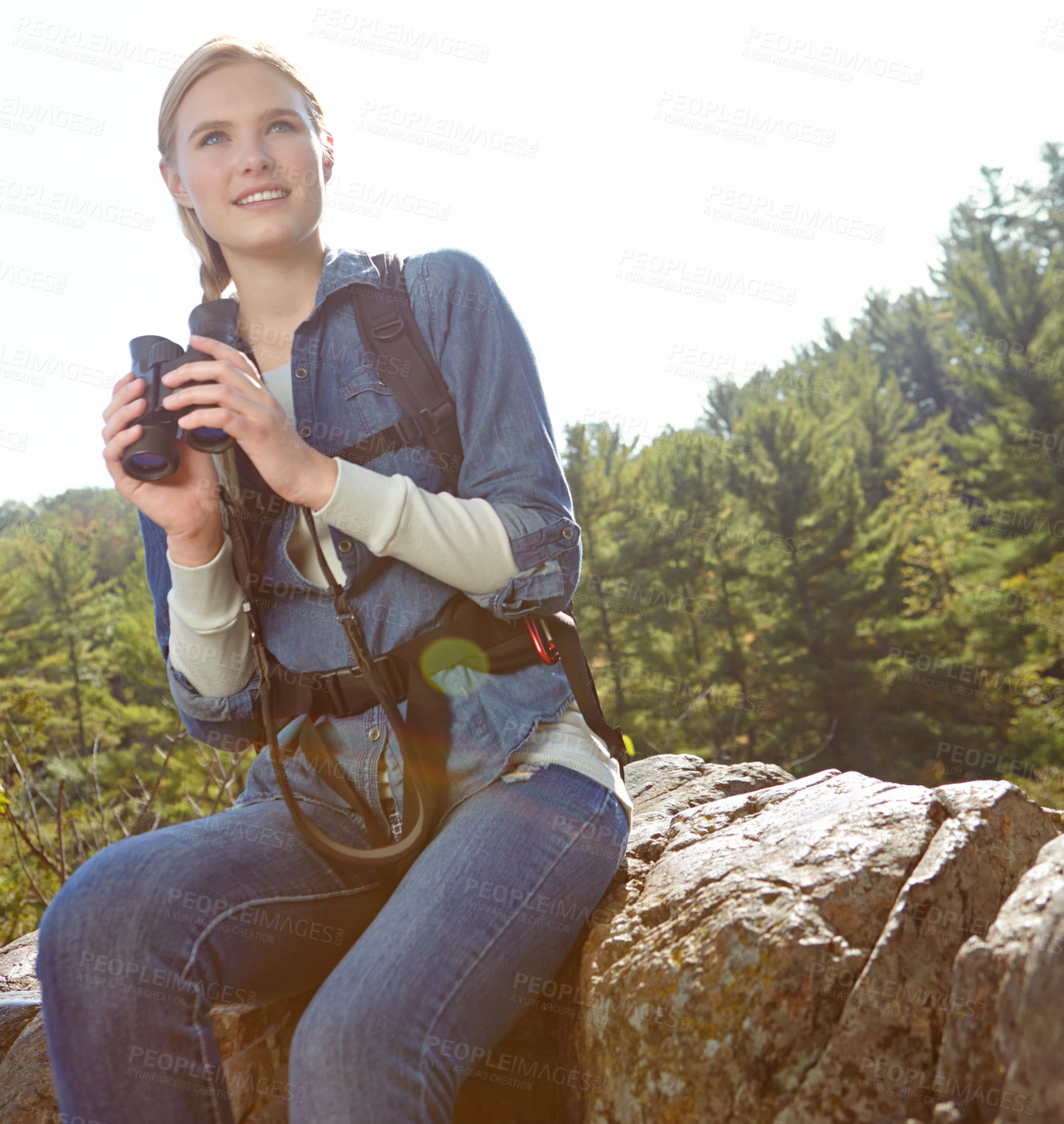 Buy stock photo Trekking, binoculars and relax with woman in nature for wildlife biologist, field research and ecology. Wellness, travel and adventure with person for environment study, conservation and hiking