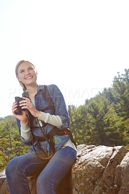 Buy stock photo Trekking, binoculars and smile with woman in nature for wildlife biologist, field research and ecology. Wellness, travel and adventure with person for environment study, conservation and hiking