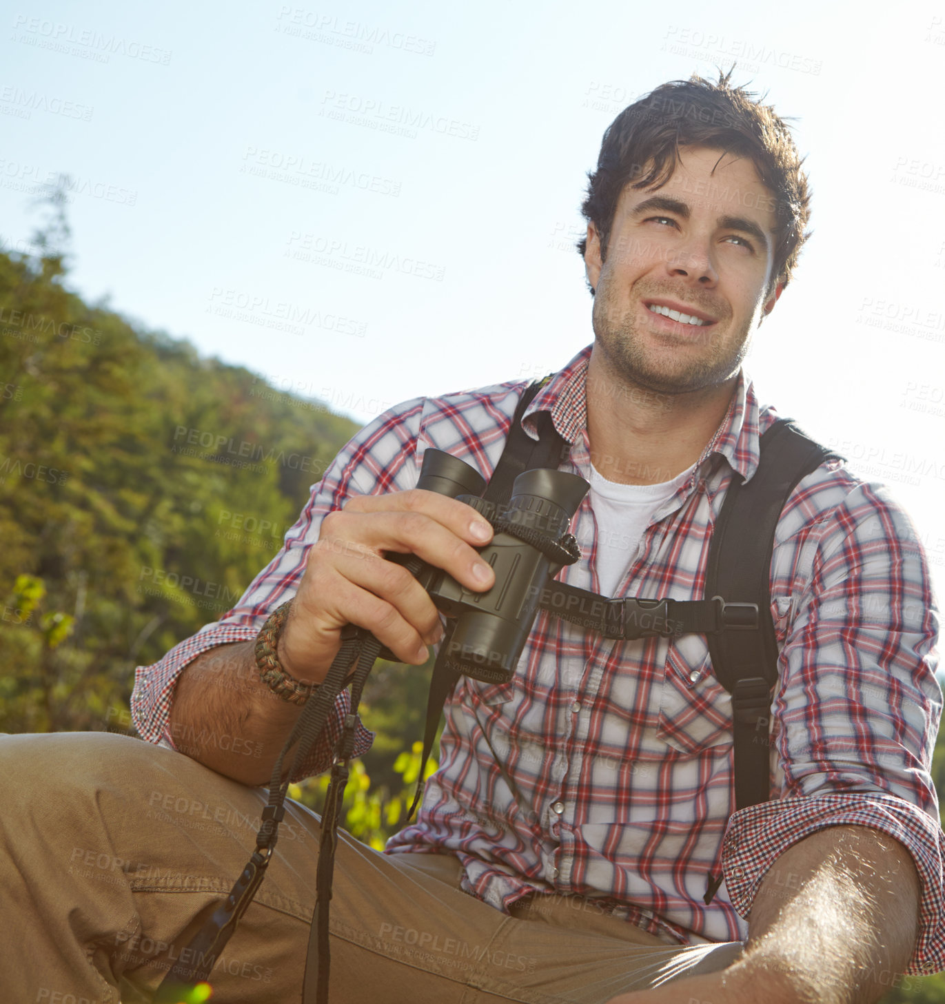 Buy stock photo Trekking, binoculars and forest with man in nature for wildlife biologist, field research and ecology. Wellness, travel and adventure with person for environment study, conservation and hiking