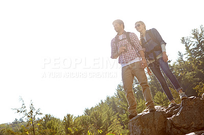 Buy stock photo Nature, mockup or happy couple hiking in mountain for binocular or outdoor adventure in woods or forest. Space, view or people sightseeing together on holiday vacation, trip or break to explore park