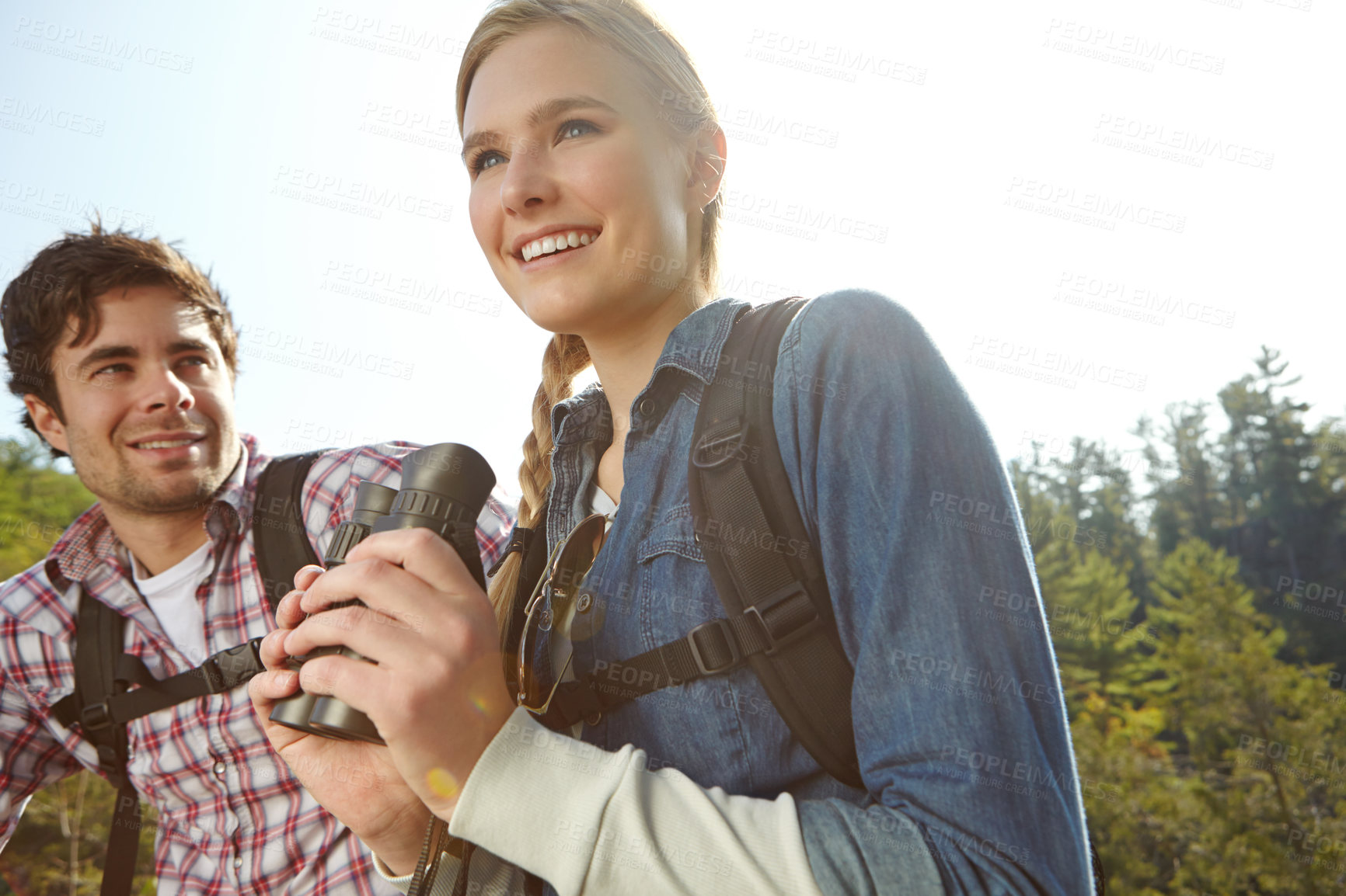 Buy stock photo View, binocular or happy couple in park or mountain for travel and outdoor adventure in woods. Watching, hiking or people sightseeing together on holiday vacation, trip or break to explore forest