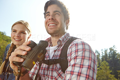 Buy stock photo Looking, binocular or happy couple in woods or mountain for travel and outdoor adventure in park. View, hiking and people sightseeing together on holiday vacation, trip or break to explore forest