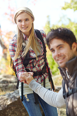 Buy stock photo Nature, hiking and couple helping on adventure trail in forest for backpacker vacation. Health, happy woman and man with camping, holiday and holding hands together with summer Norway woods outdoors