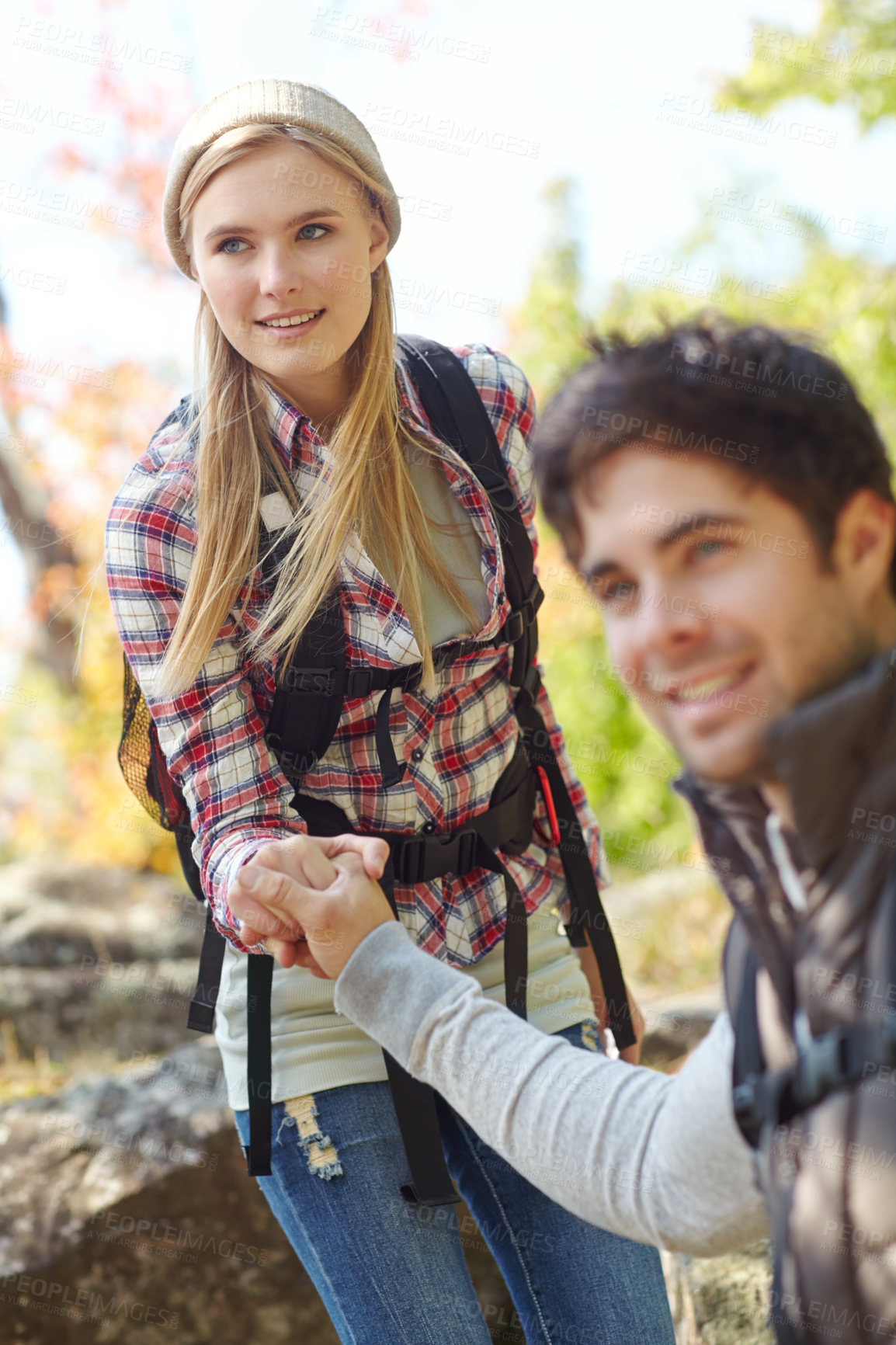 Buy stock photo Nature, hiking and couple helping on adventure trail in forest for backpacker vacation. Health, happy woman and man with camping, holiday and holding hands together with summer Norway woods outdoors