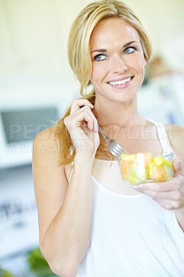 Buy stock photo Woman thinking, eating and fruit salad in kitchen with smile, healthy breakfast or minerals for vitamins. Home, Australia and happy person with organic food for wellness, benefits or diet nutrition 