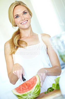 Buy stock photo Fruit, portrait and woman with watermelon, home and slicing of nutrition, smile and vitamin  c for health. Kitchen, hydration and chopping of food, potassium and wellness of person, morning and house