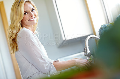 Buy stock photo Woman, portrait and vegetables wash at kitchen sink with smile in home. Happy, wellness and cleaning for hygiene, breakfast and cooking with asparagus and meal with food, health and nutrition