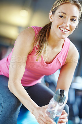 Buy stock photo Gym, portrait and woman with bottle, fitness and relax on workout break with confidence. Water, drink and happy athlete girl with calm mindset for exercise, healthy body care and wellness at club.