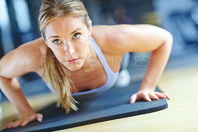 Buy stock photo Mat, muscle and push up with woman in gym for training, body fitness and workout. Floor exercise, strong and sports athlete with female person and commitment for energy, wellness and movement