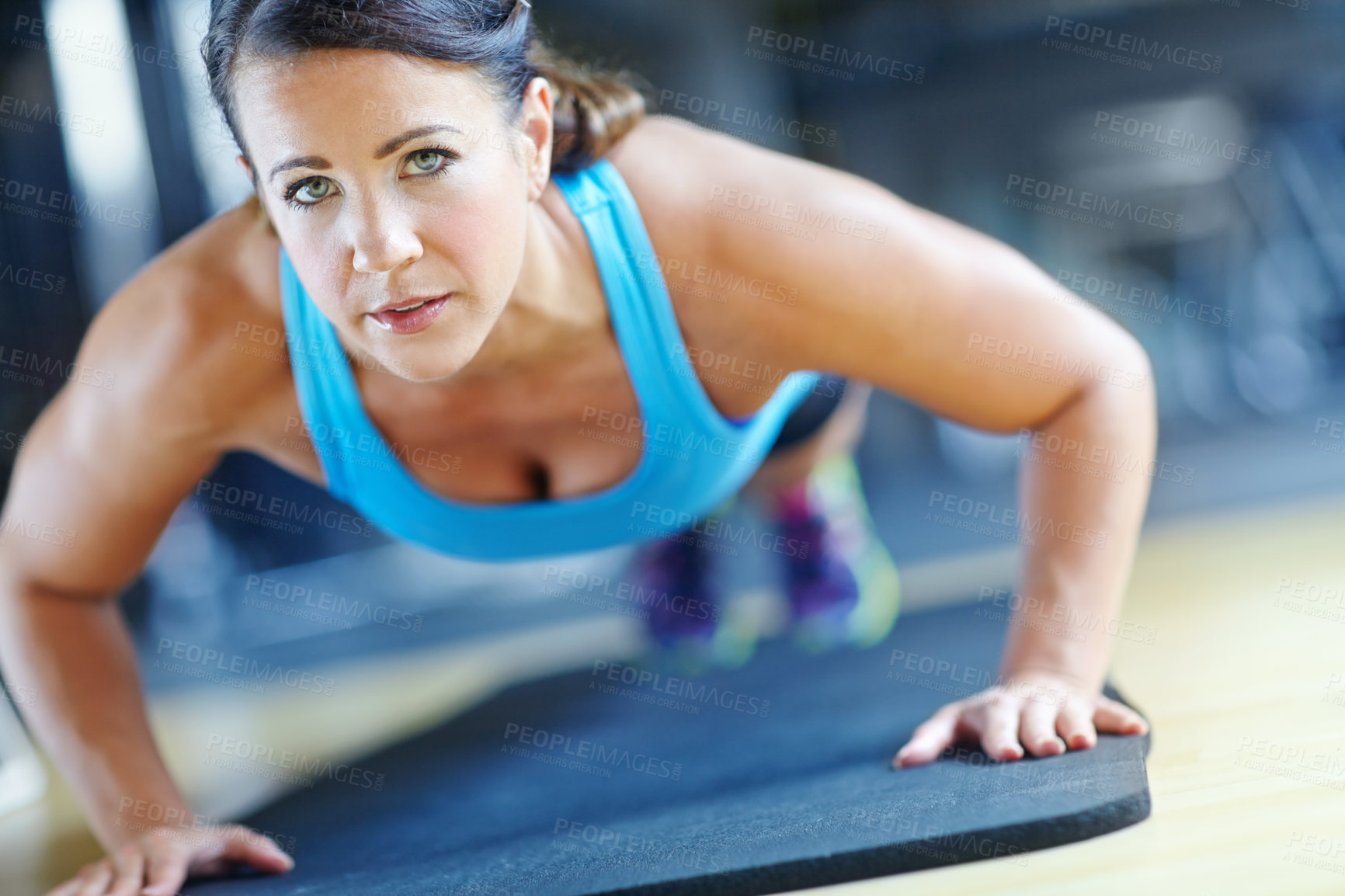 Buy stock photo Fitness, push up and woman in gym for exercise, workout and training for performance or endurance. Sports, serious and person on floor for strong, wellness or health for strength, muscle and active