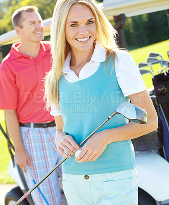 Buy stock photo Portrait, woman or happy on golf course for sport, professional or enjoyment of game. Smile, couple or club on grass for support, skill development or coordination training in recreation activity