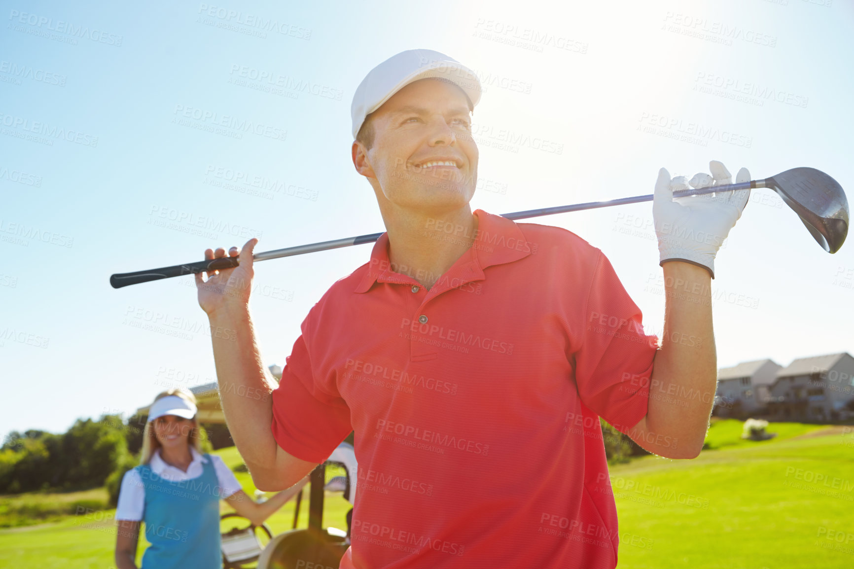 Buy stock photo Golf course, confidence and man with smile, club and outdoor fun for fitness on weekend morning. Pride, teamwork and happy couple on green field for sports date, health and wellness with partnership.