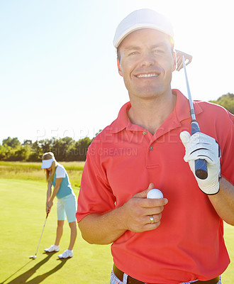 Buy stock photo Golf, portrait and man with smile, fun and outdoor game for fitness on weekend morning together. Confidence, teamwork and happy couple on green for sports date, health and wellness with partnership.