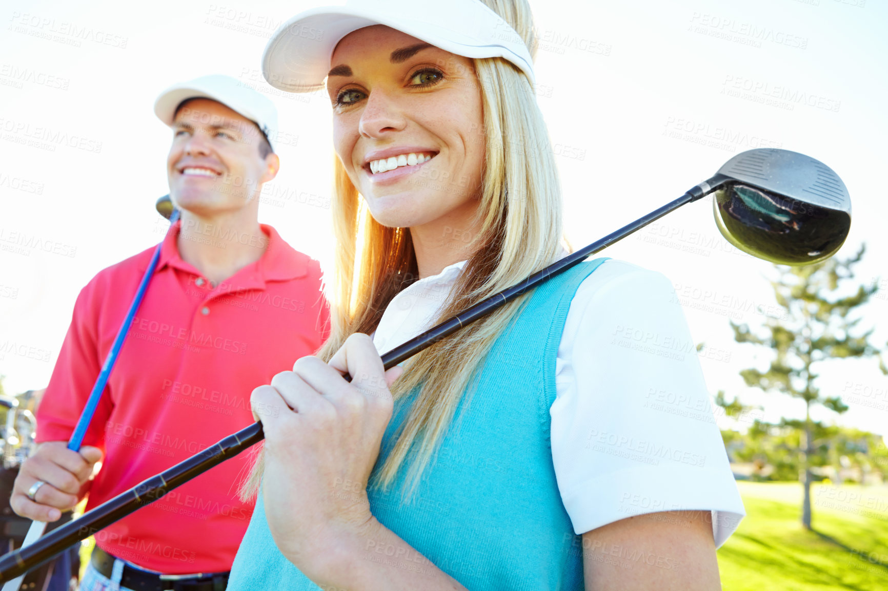 Buy stock photo Golf, woman and happy couple with club for sport or game with wood driver in nature. Golfers course, man and partner smile outdoor for exercise, training or competition practice for fitness together