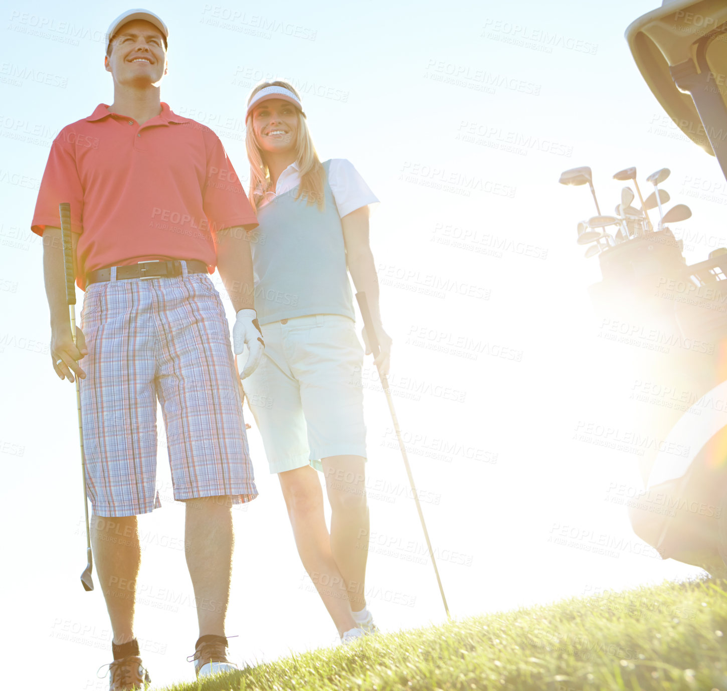 Buy stock photo Happy, couple and thinking with club at golf course for outdoor sports, practice or bonding together. Low angle, man and woman with equipment by grass for weekend hobby, exercise or training at field