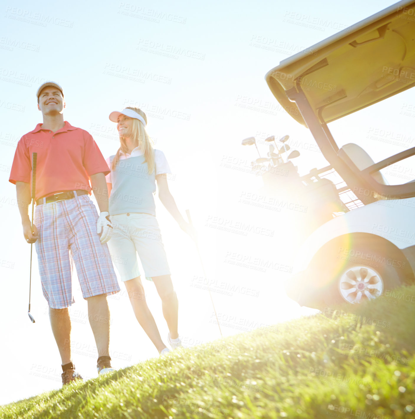 Buy stock photo Sports, golf and couple on course in morning for game, match and competition on grass field for activity. Golfer, hobby and man and woman for training, fun and practice to relax, bonding and playing