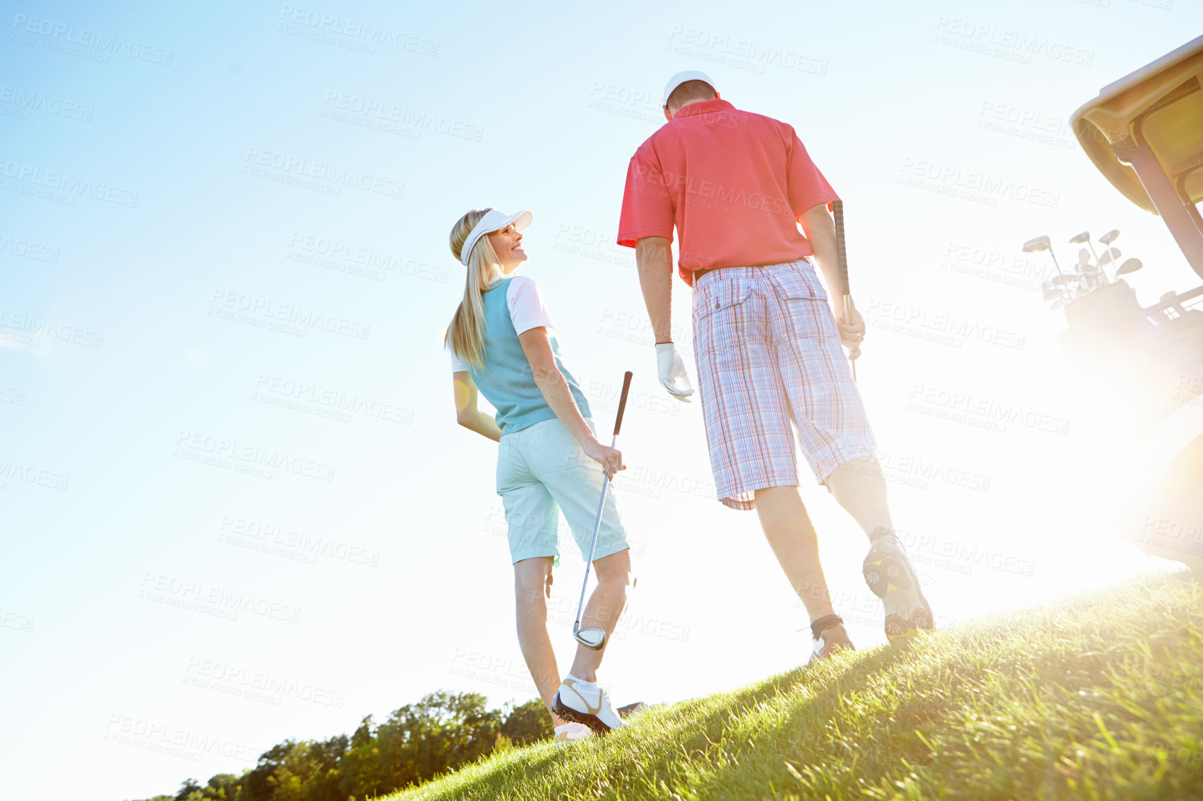 Buy stock photo Sports, golf and back of couple in morning for game, match and competition on course, field and grass. Golfer, hobby and happy man and woman for playing, fun activity low angle and practice together 