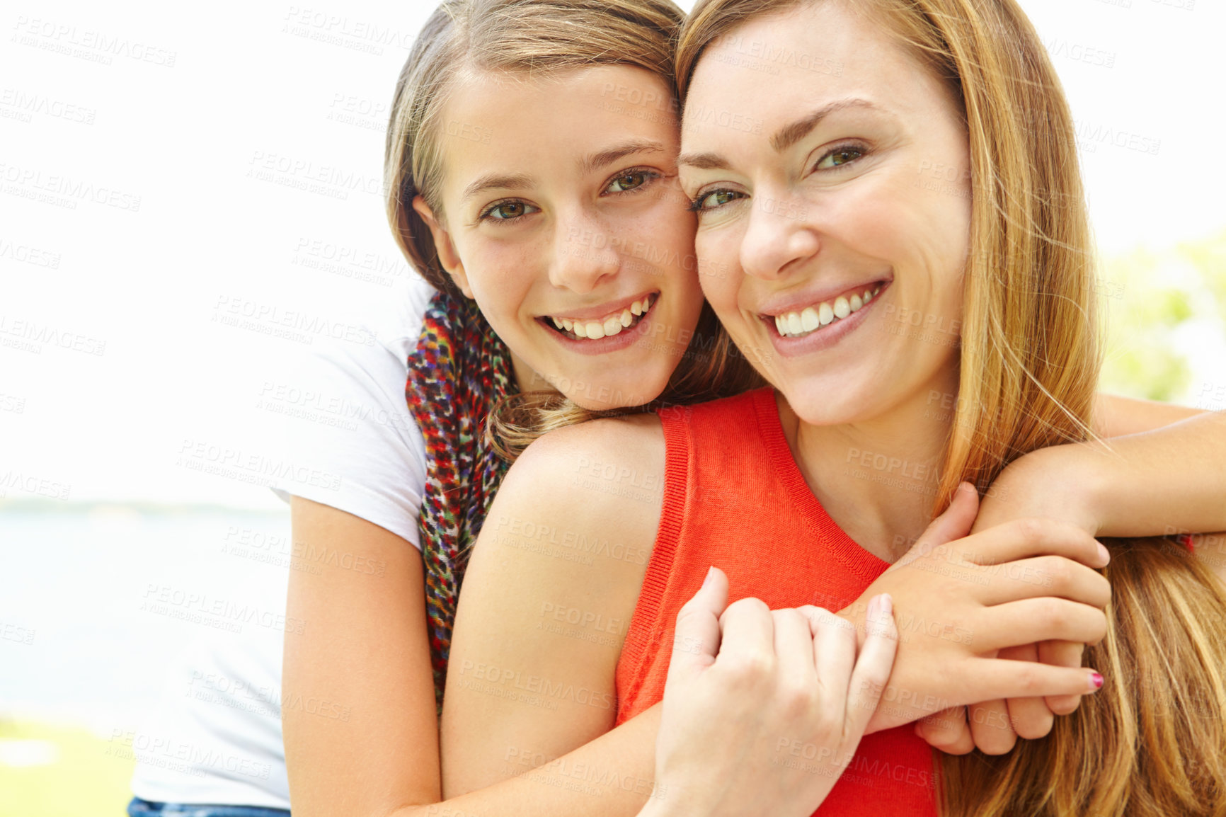 Buy stock photo Portrait, mom and girl in park, hug and smile with happiness, bonding together and daughter. Face, happy family and single parent with child, mama and embrace with weekend break, nature and playful