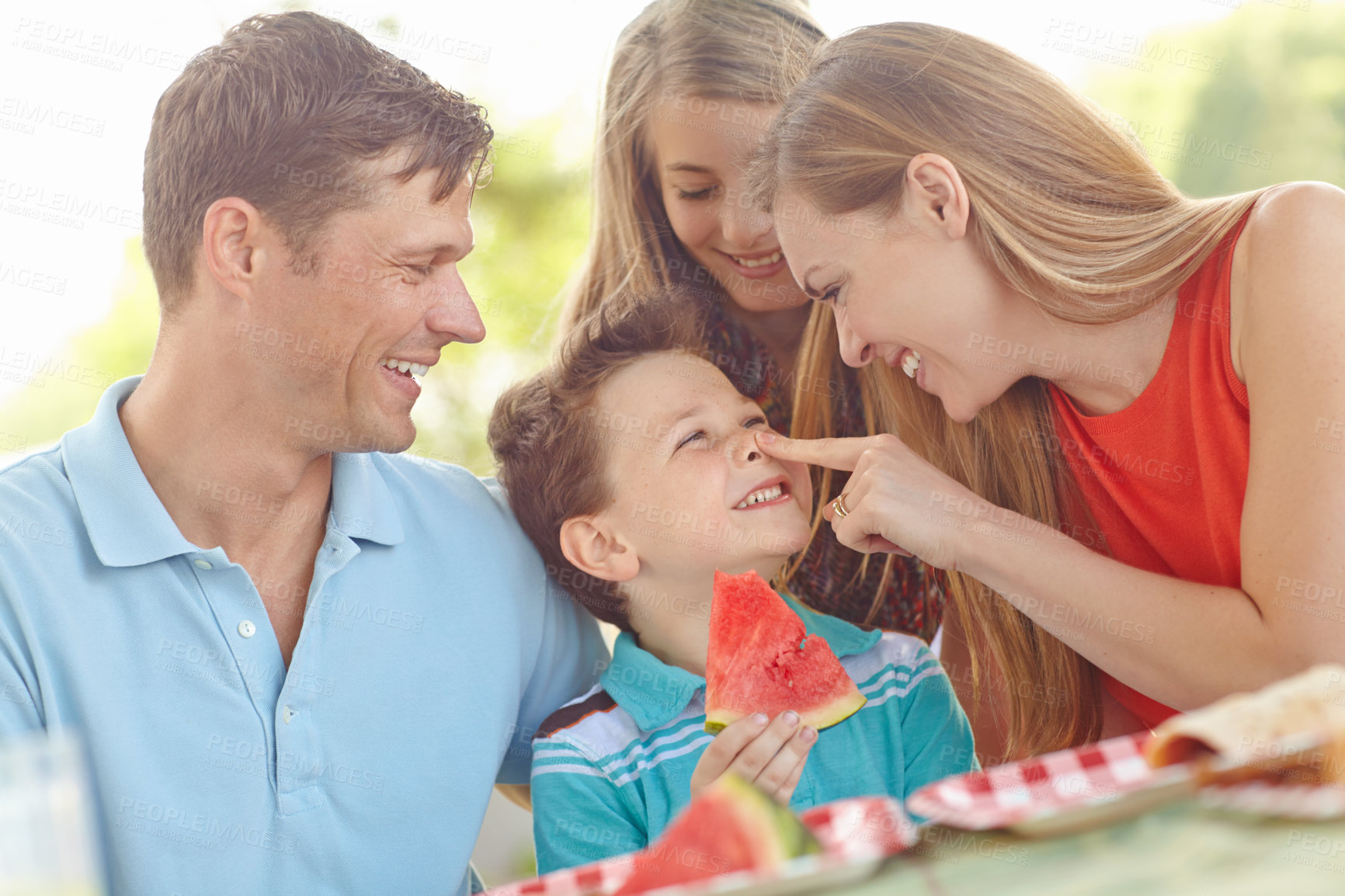 Buy stock photo Happy family, games or excited in nature for picnic, fun activity or watermelon for refreshing snack. Parents, children or favorite fruit in park for relationship development on vacation in Australia