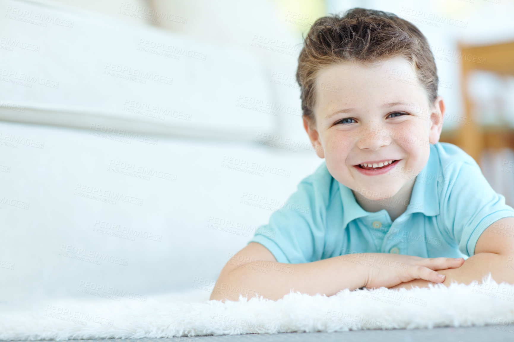 Buy stock photo Boy, happy child and rest in home portrait, morning confidence and chilling on floor of living room. Male person, kid and comfortable on carpet in France, healthy growth and development in lounge