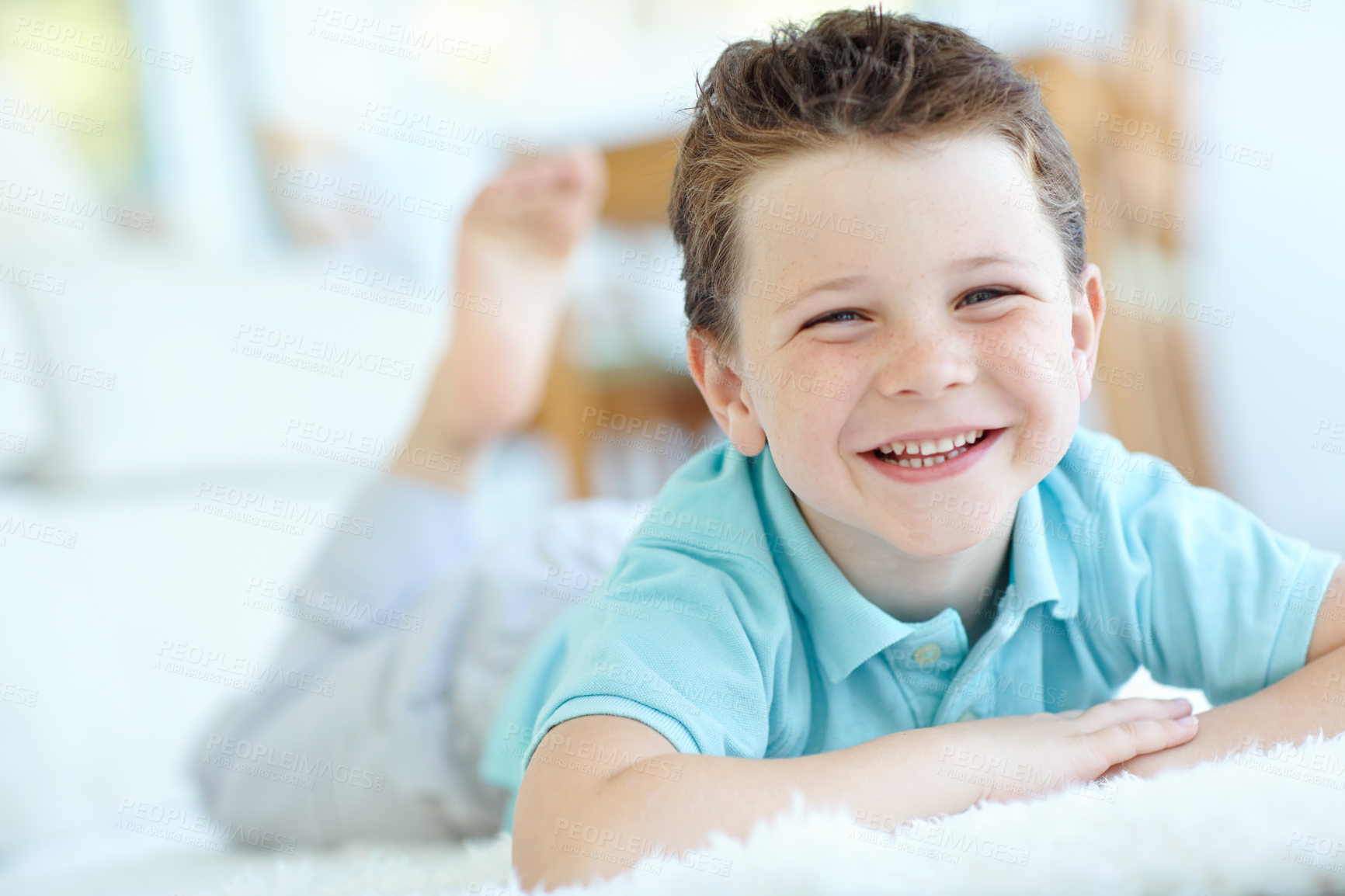 Buy stock photo Boy, happy child and confident in home portrait, morning joy and chilling on floor of living room. Male person, kid and comfortable on carpet in France, healthy growth and development in lounge