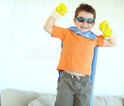 Buy stock photo Flex muscle, child and happy superhero in home to play fantasy game. Smile, cute boy or strong hero with power in costume to fight for justice, courage or creative cosplay in living room on halloween