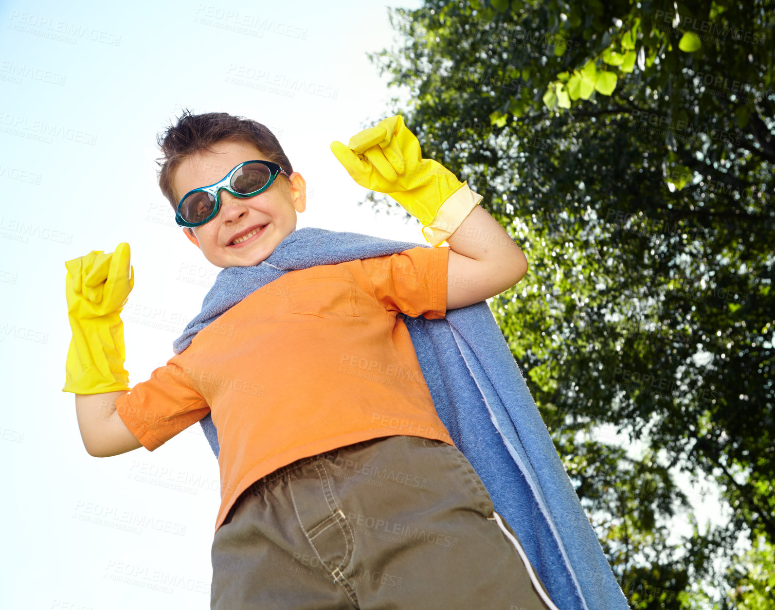 Buy stock photo Costume, portrait and superhero with boy in garden for child development, games or growth in summer. Fantasy, smile and sunglasses with playful kid in cape outdoor for crime fighting or defending