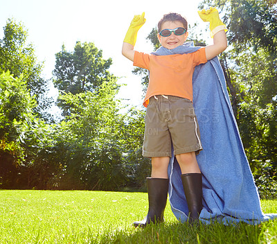 Buy stock photo Champion, portrait and superhero with boy in garden for child development, games or growth in summer. Cape, fantasy and sunglasses with happy kid in costume outdoor for crime fighting or defending