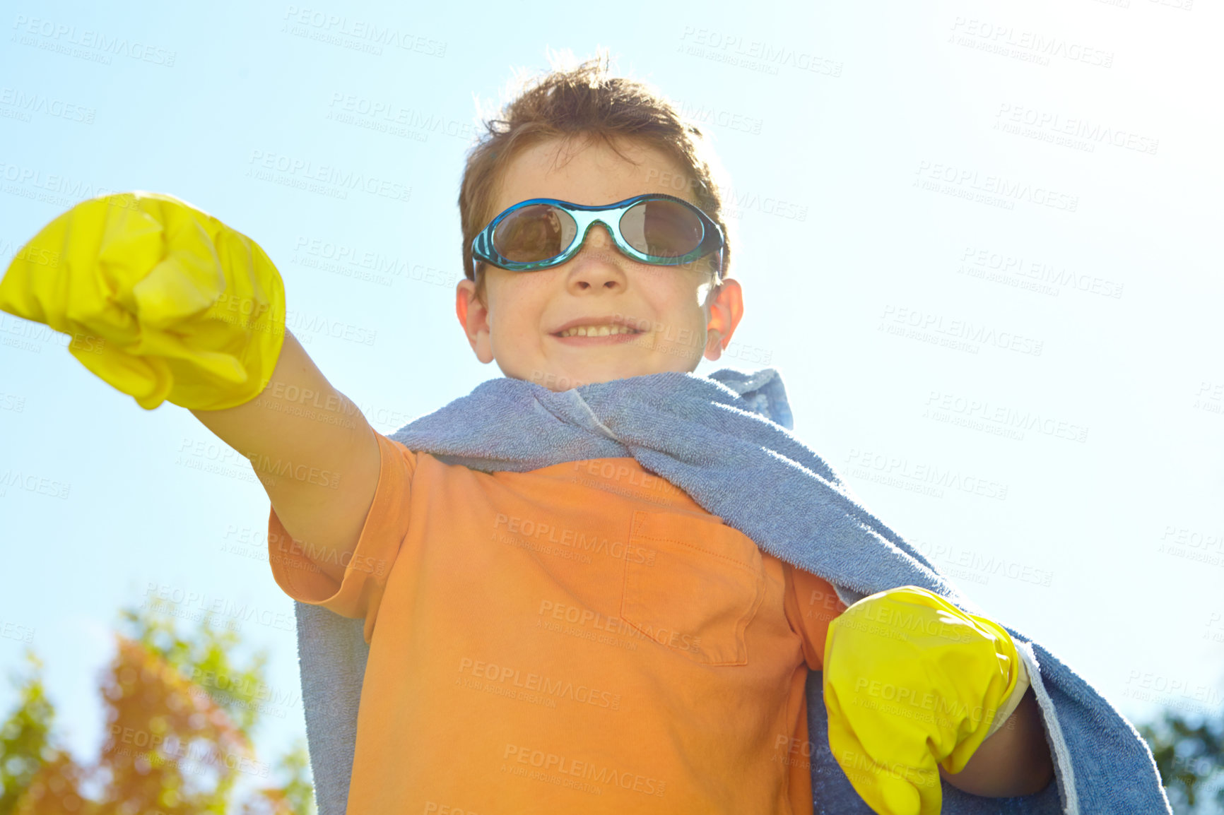 Buy stock photo Portrait, smile and superhero with boy in garden for child development, games or growth in summer. Face, fantasy and sunglasses with kid playing in costume outdoor for crime fighting or defending