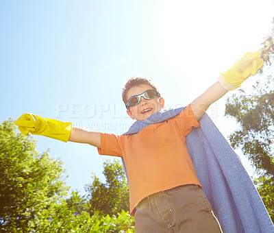 Buy stock photo Kid, freedom and superhero portrait outdoor with fantasy game, play or pretend character with smile. Boy person, mockup and action fist with imagination for child development, adventure and halloween