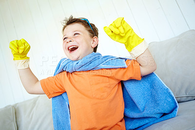 Buy stock photo Boy, happy and superhero costume in home with fantasy game, playing and strong pretend character. Kid, person and action fist for child development, adventure and halloween in house with imagination